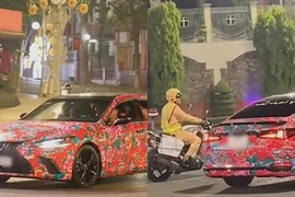 Xe ô tô dán giấy trang trí với họa tiết sặc sỡ... có bị phạt không?