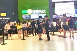 Người đi xem phim ở rạp không được livestream hoặc quay lén rồi phát tán lên các trang mạng xã hội. Ảnh: ĐL
