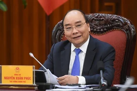 Thủ tướng Nguyễn Xuân Phúc chủ trì cuộc họp Thường trực Chính phủ về phân bổ vốn đầu tư công trung hạn. Ảnh: VGP