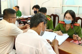 Nếu chỗ ở mới trong phạm vi cấp xã đã đăng ký thường trú thì không bắt buộc phải đăng ký tạm trú. Ảnh: NGUYỄN TÂN