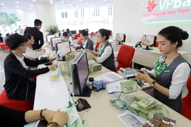 Lãi suất huy động có dấu hiệu hạ nhiệt trong thời gian qua, đặc biệt là sau tết Nguyên đán. Ảnh: TL