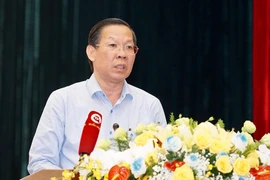 Chủ tịch UBND TP.HCM Phan Văn Mãi cho biết các doanh nghiệp mong muốn lãi suất cho vay giảm xuống còn 7%-8%/năm. Ảnh: TL