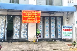 Địa phương treo băng rôn cảnh báo khu cho thuê hộp ngủ không đảm bảo an toàn về PCCC. Ảnh: N.CHÂU