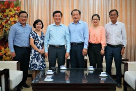 Sở Tư pháp TP.HCM chúc mừng báo Pháp Luật TP.HCM nhân ngày 21-6