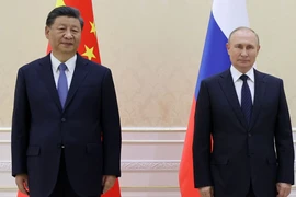 Chủ tịch Trung Quốc Tập Cận Bình (bên trái) và Tổng thống Nga Vladimir Putin. Ảnh: AP 