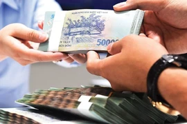 Ngân hàng Nhà nước thúc giảm lãi suất cho vay, phí dịch vụ thanh toán