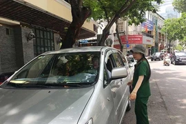 Chủ tịch UBND TP.HCM đề nghị xử lý nghiêm vụ hành hung nhân viên thu phí đậu xe