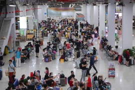 Bến xe Miền Đông mới nhộn nhịp đưa hành khách về quê ăn Tết