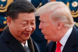 Chủ tịch Trung Quốc Tập Cận Bình (trái) và Tổng thống Mỹ Donald Trump 