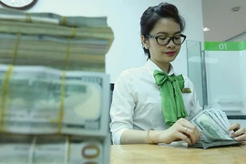 Bất ngờ tăng giá Đô la Mỹ, Ngân hàng Nhà nước nói gì?