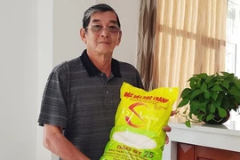 Ông Hồ Quang Cua rất tự hào về gạo ST25- Ảnh: Zing.vn