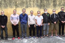 Tám người bị công an bắt giữ. Ảnh: CACC