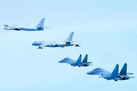 Bắc Kinh triển khai J-16 hộ tống các máy bay ném bom Trung Quốc, Nga tuần tra chung 