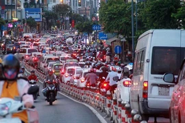 Giao thông TP.HCM hỗn loạn ngày cận Tết