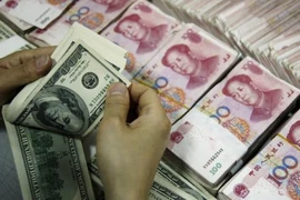 Đồng nhân dân tệ giảm giá sẽ tổn thương châu Á