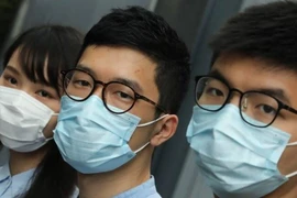 Các nhân vật đảng Demosisto phản đối áp luật an ninh quốc gia ở Hong Kong. Ảnh: SCMP