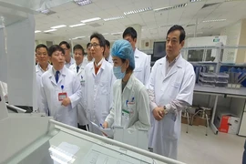 Việt Nam cách ly 2 người về từ Trung Quốc nghi mắc virus lạ