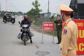 Thêm 2 ca COVID-19, 1 ca liên quan với BN243 