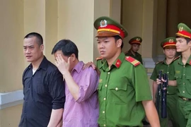 Tòa kết luận vụ mang 1.000 tờ USD giả đổi ngân hàng