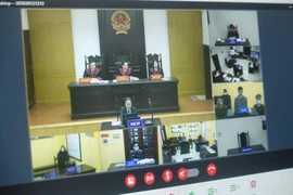 Quang cảnh phiên tòa trực tuyến đầu tiên trên cả nước. Ảnh: tapchitoaan.vn