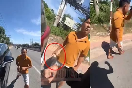 Clip: Cán bộ cảnh sát giao thông mặc đồ thường chửi thề, cầm gạch đá định đánh người