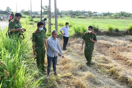 Nguyễn Tiến Ngân tại hiện trường án mạng. Ảnh: HG