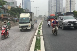 Hoàn thiện nâng cấp đường Võ Văn Kiệt đón Tết Tây