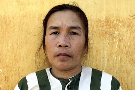 Lê Thị Thu tại cơ quan công an. Ảnh: LQL