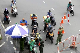 TP.HCM bỏ giấy đi đường, chốt kiểm soát ở nội đô sau 30-9