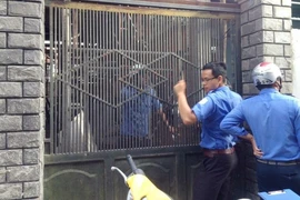 Tát, nhốt cán bộ phường xử lý nhà xây trái phép