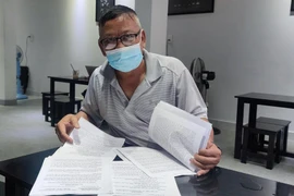 Chờ giám đốc thẩm nên… chưa thi hành