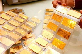Giá vàng trong nước rẻ hơn thế giới 200.000 đồng/lượng