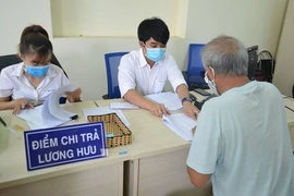 Sớm chi trả trợ cấp an sinh xã hội cho người dân qua ngân hàng