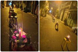 Bà giáo lặng thầm và dãy hàng hoa lung linh trong đêm tưởng niệm 