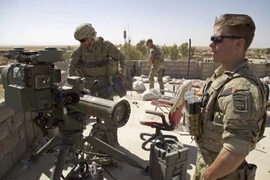Các nhóm dân quân Iraq nói sẽ ngừng tấn công nếu Mỹ rút quân 