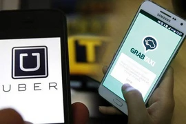 Bộ Công Thương sẽ điều tra vụ việc Grab mua lại Uber