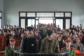 Cặp song sinh giết người, cướp tài sản lãnh 18 năm tù 