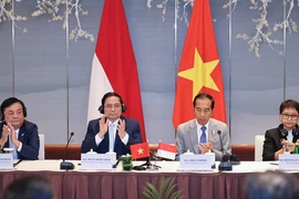Thủ tướng Phạm Minh Chính và Tổng thống Joko Widodo đồng chủ trì Đối thoại - Ảnh: VGP