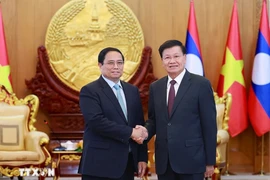 Thủ tướng Chính phủ Phạm Minh Chính hội kiến Tổng Bí thư, Chủ tịch nước Lào Thongloun Sisoulith 