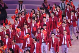 Đoàn thể thao Việt Nam trong lễ diễu hành khai mạc SEA Game 30