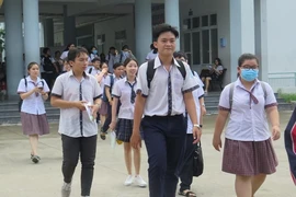 Thí sinh dự thi THPT Quốc gia năm 2019 tại TP.HCM. Ảnh: PHẠM ANH