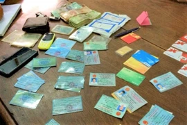 Dùng CMND giả đến ngân hàng xin đổi chữ ký để chiếm đoạt tiền