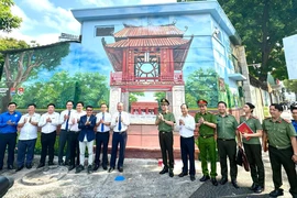 Bích họa 600 m2 góp phần chuyển hóa địa bàn ở quận 1