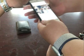 Dùng clip 'nóng' ép 1 phụ nữ về chung sống