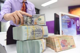 Tiền đồng đang dư thừa trong nhà băng