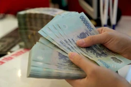 Tiền đồng đang tăng giá so với USD