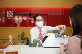 Kho bạc Nhà nước bắt tay với ngân hàng thu thuế