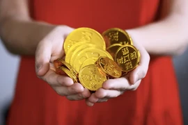 Giá vàng tiếp tục trượt dài