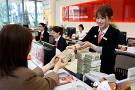 Áp lực lên tỉ giá USD/VND vẫn tiếp tục diễn ra