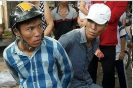 Tên cướp nhảy xuống ao vẫn bị người dân lôi lên 